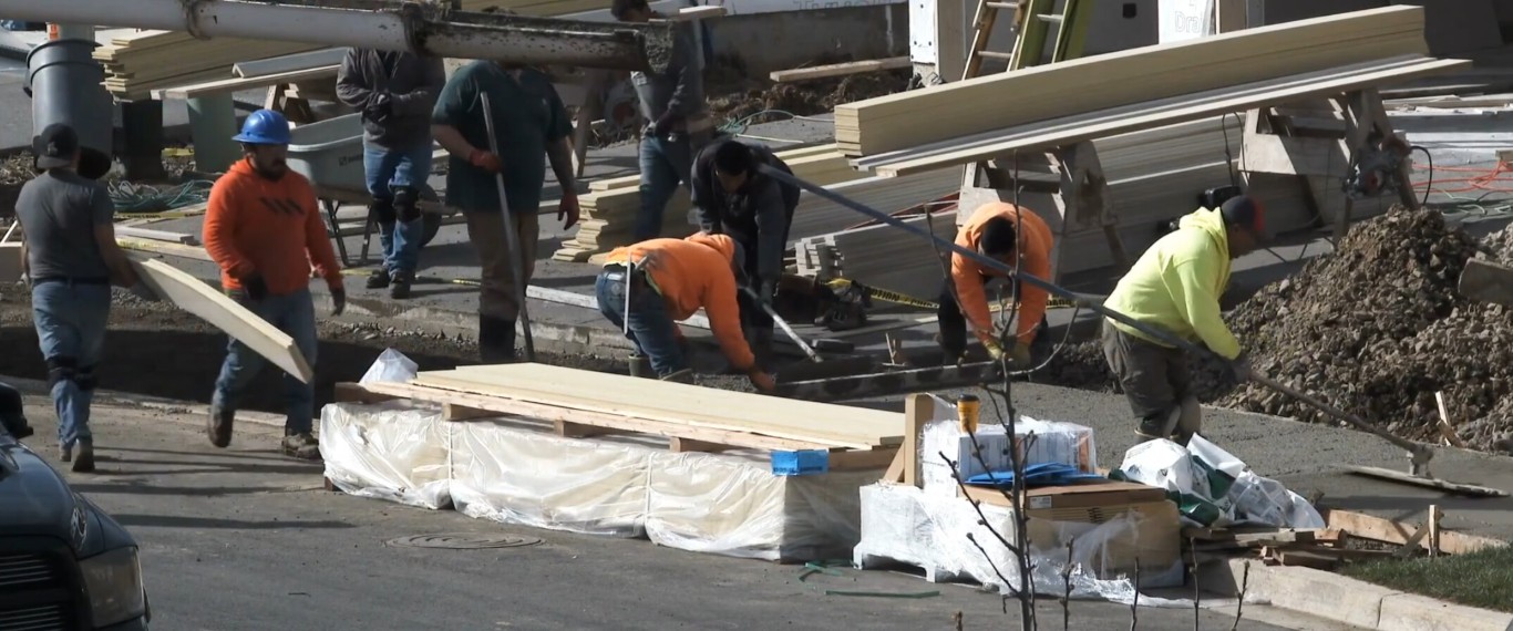 Concrete workers preparing site for pour in Buena Park